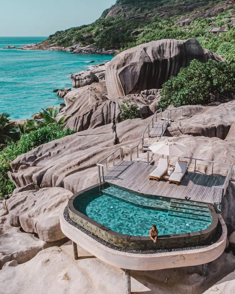 Six Senses Zil Pasyon private villa perched above turquoise water in the Seychelles