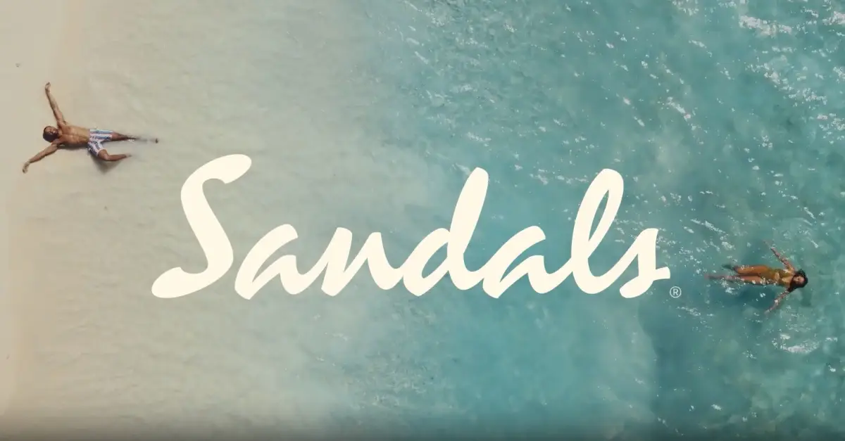 Sandals overwater bungalow and boardwalk over clear water